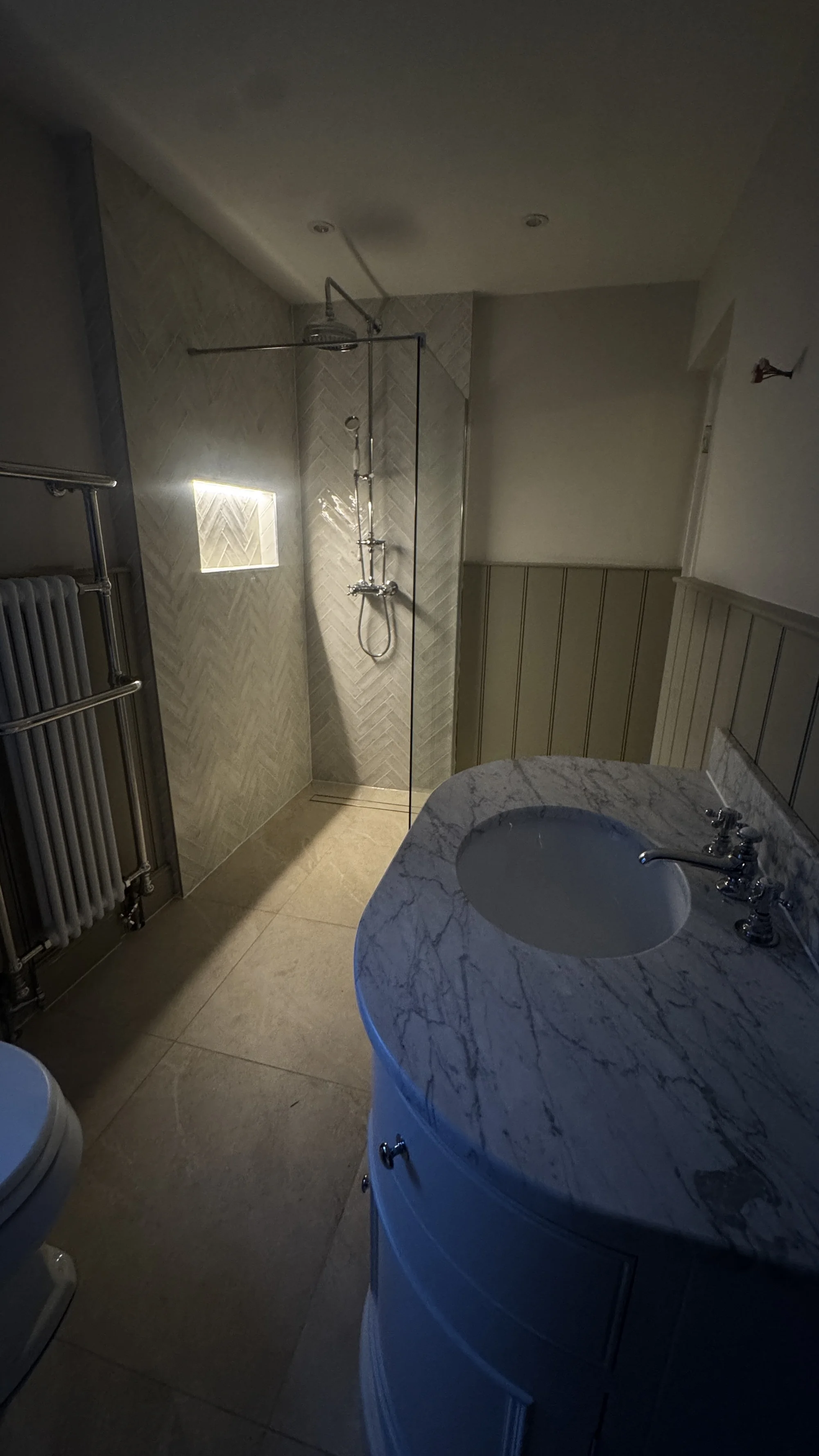 Shower area and marble vanity, bathroom renovation