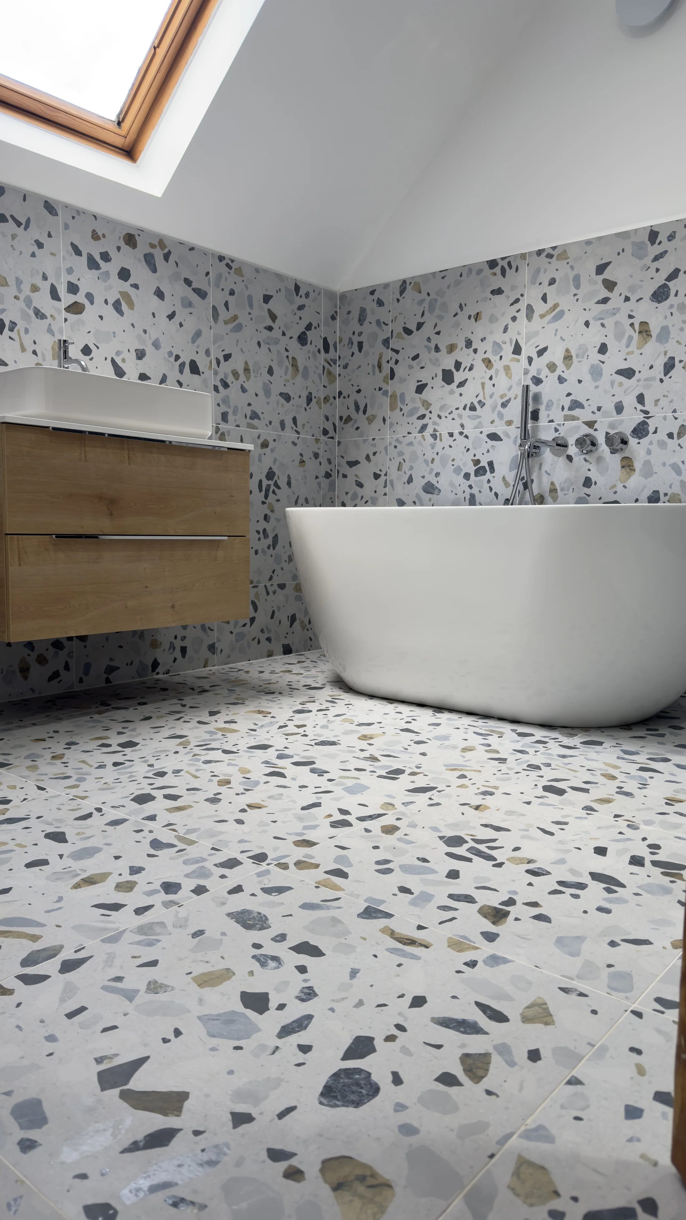 Countertop basin and oak vanity beside the freestanding bath, Letchworth Garden City