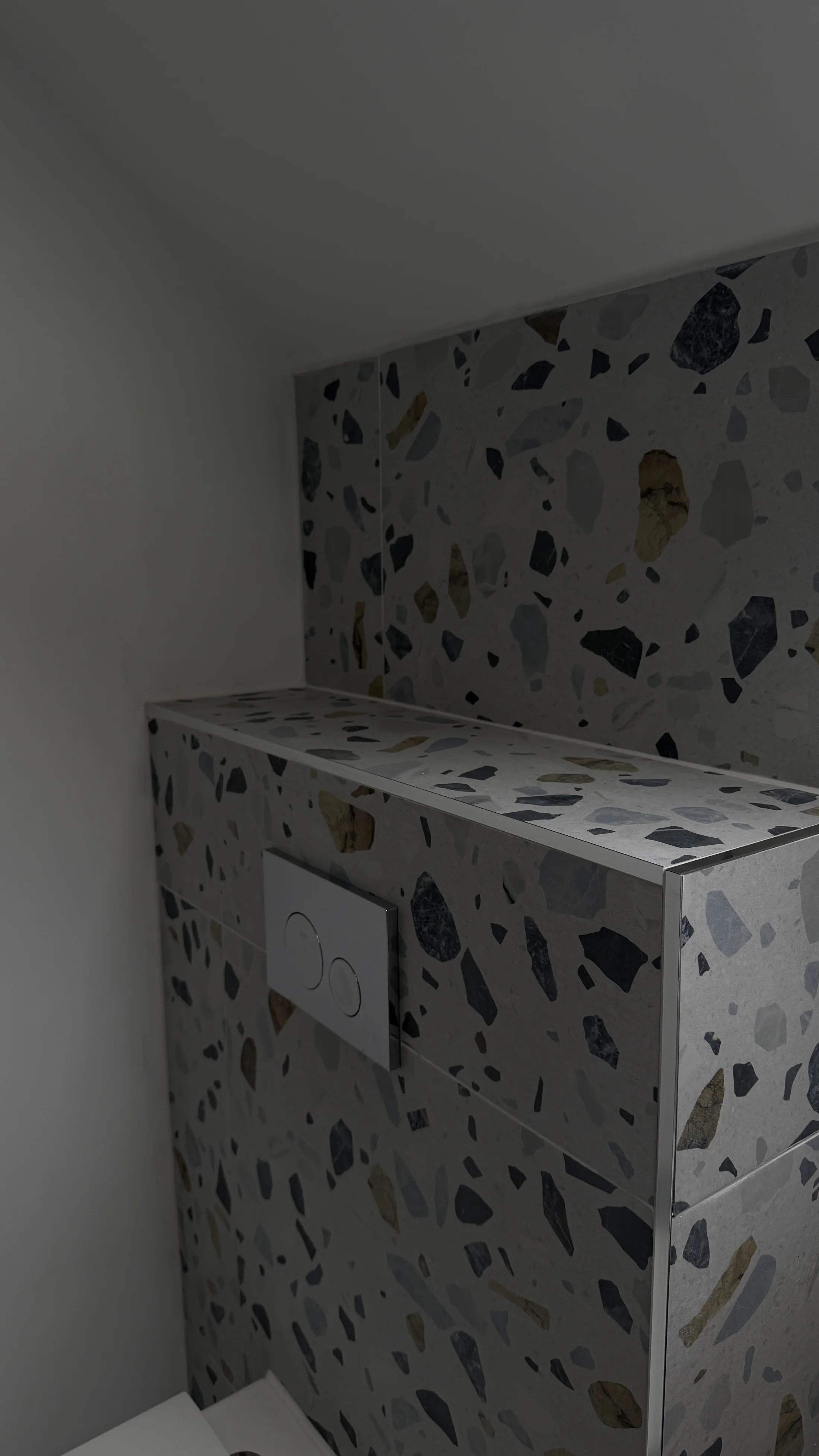 Terrazzo-tiled concealed cistern and shelf detail, Letchworth Garden City
