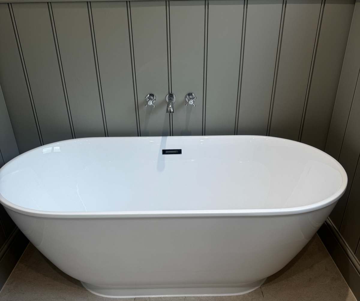 Contemporary bathtub installation by JLP Plumbing