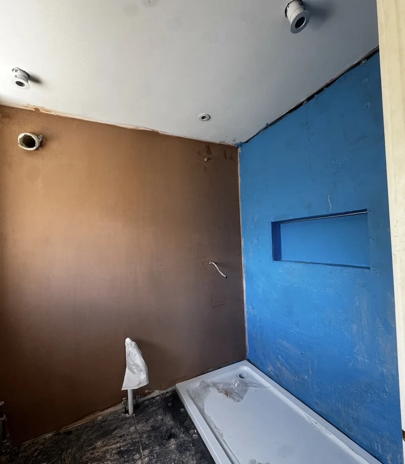 Shower area fully tanked and walls plastered, en suite renovation St Albans