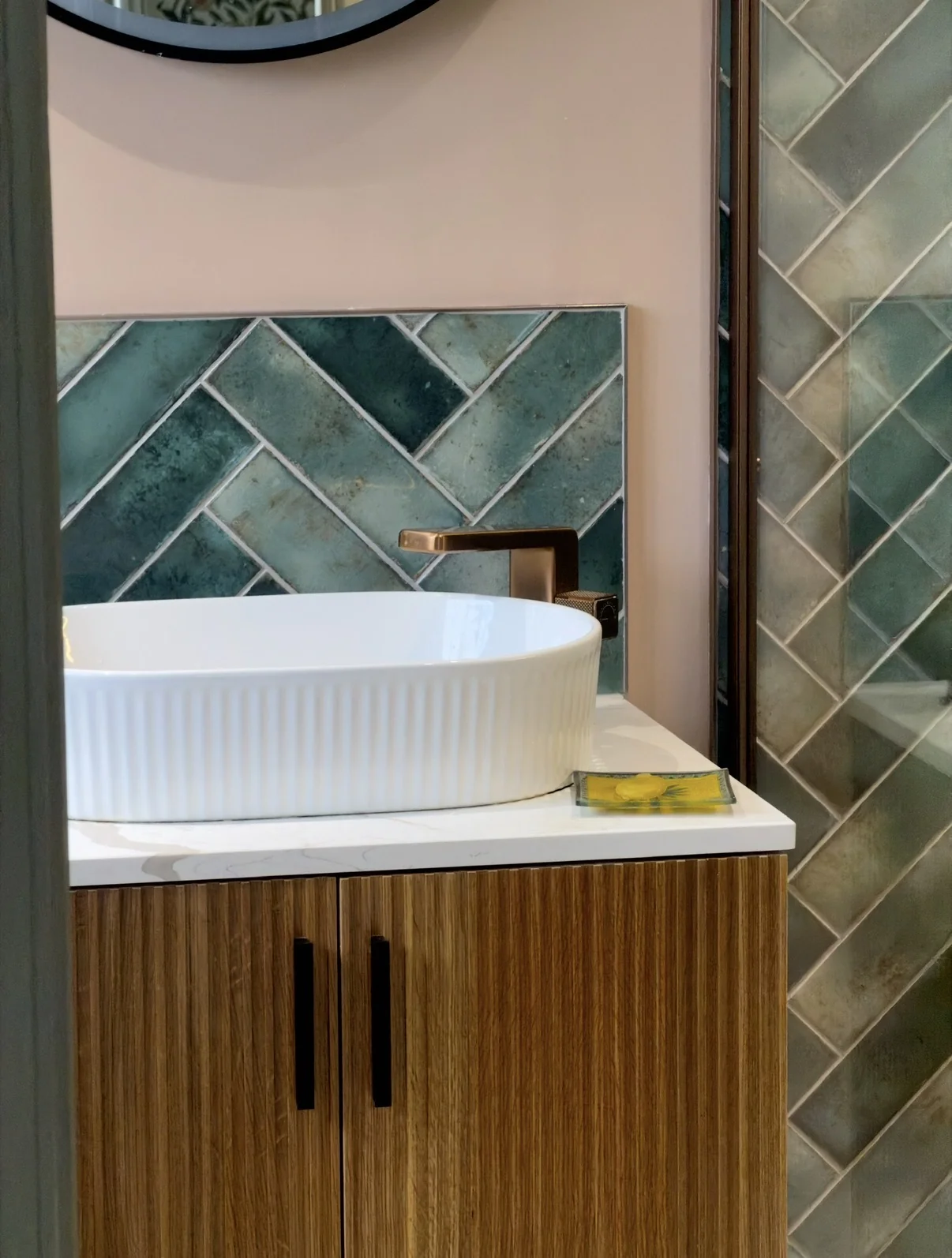 Basin, copper tap and herringbone splashback, en suite renovation St Albans