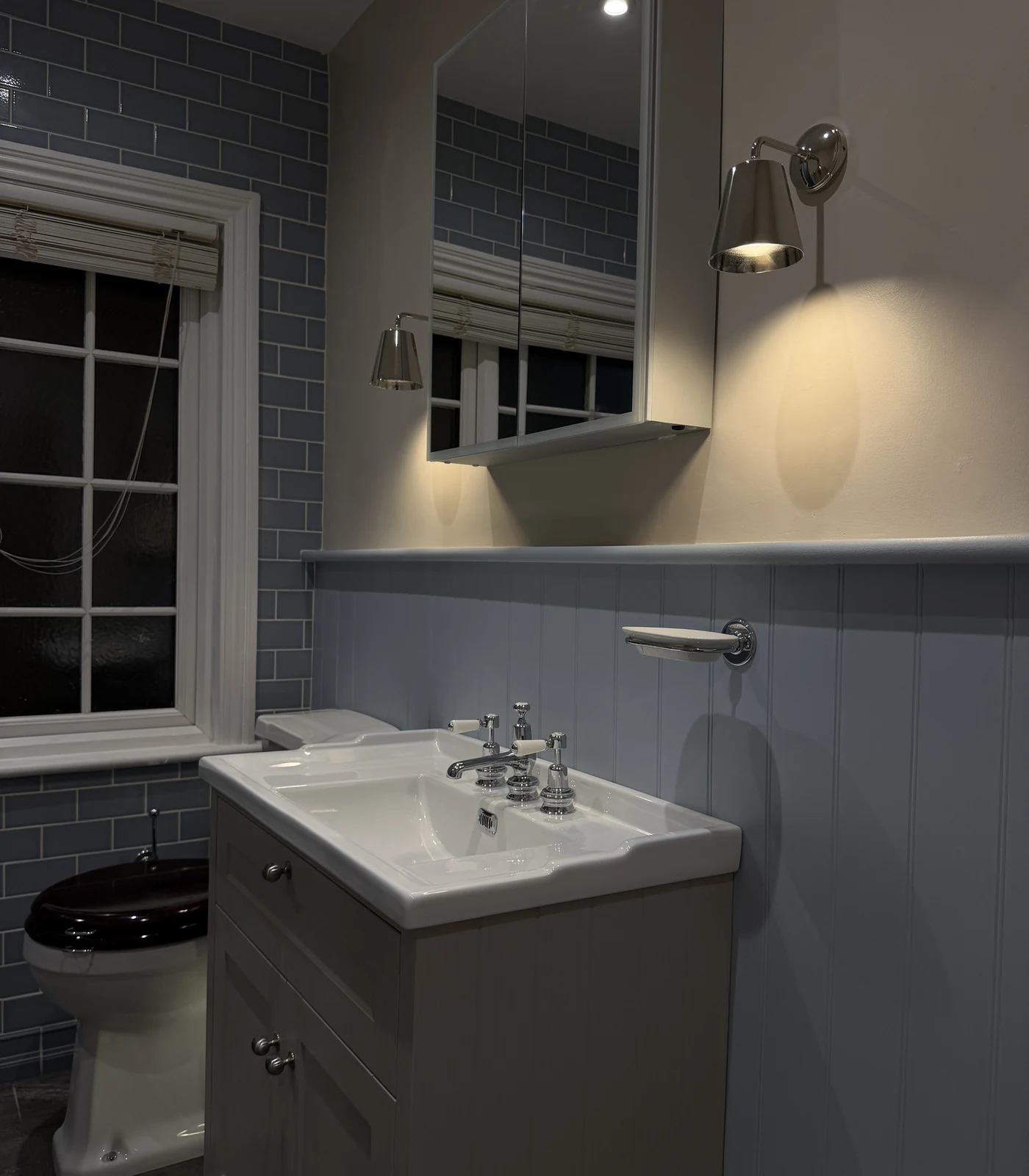 Basin, vanity and window in a walk-in shower room, St Albans