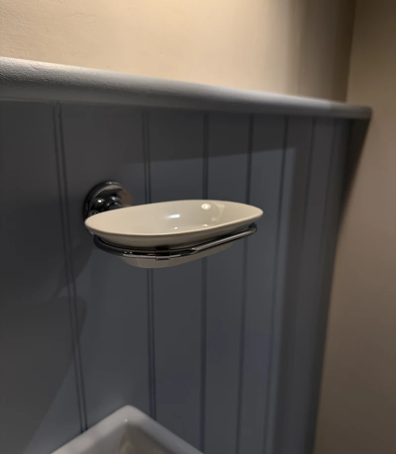 Soap dish set on tongue-and-groove panelling, St Albans
