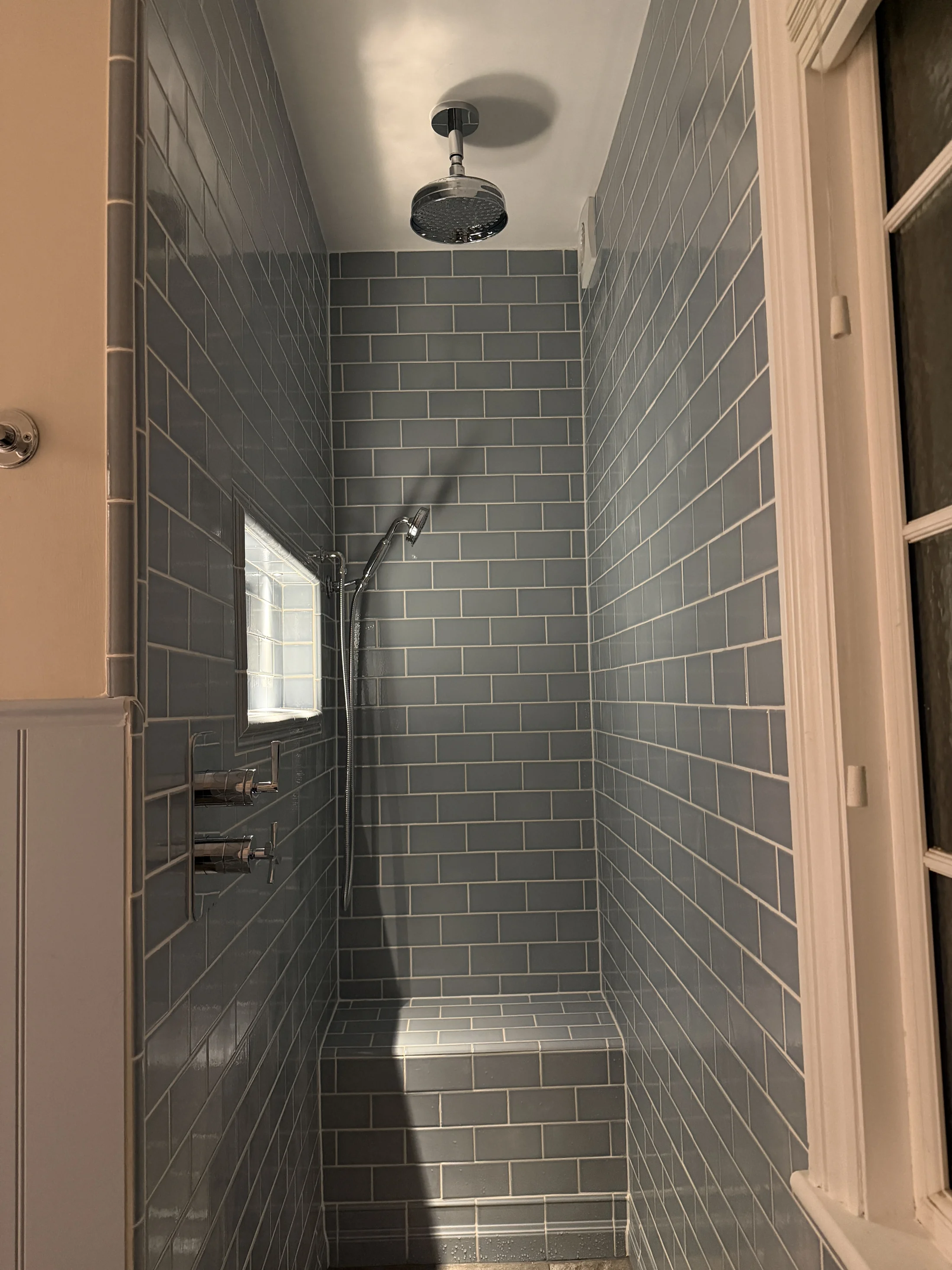 Walk-in shower room with dark metro tiling, St Albans