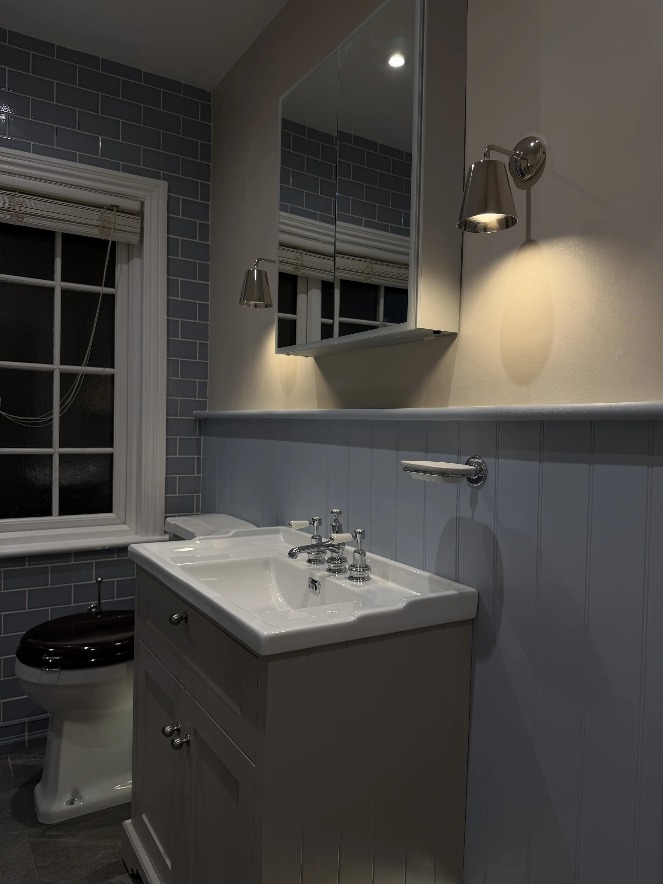 Basin, window and panelling in the shower room, St Albans
