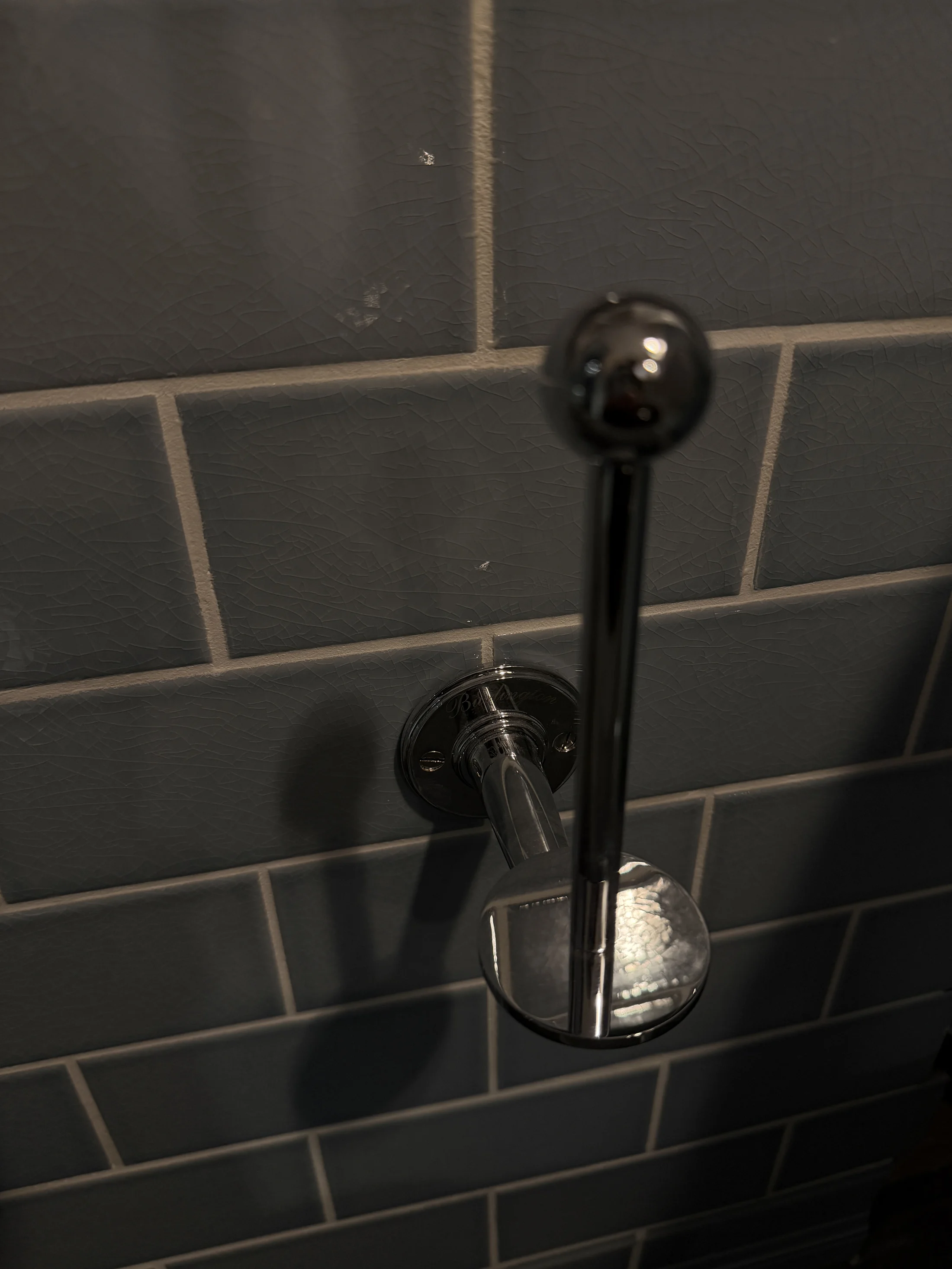 Chrome shower valve detail on metro tiling, St Albans