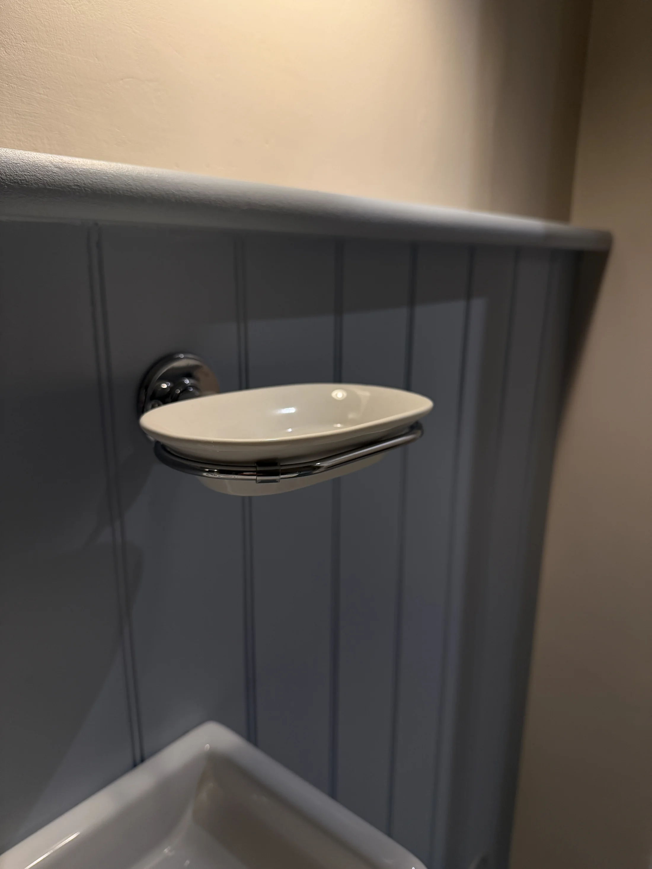 Soap dish on tongue-and-groove panelling, St Albans