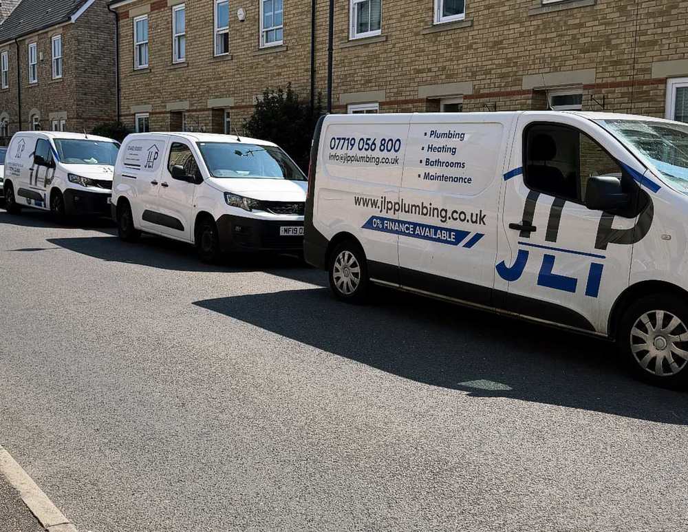 JLP Plumbing van fleet on a Hertfordshire street